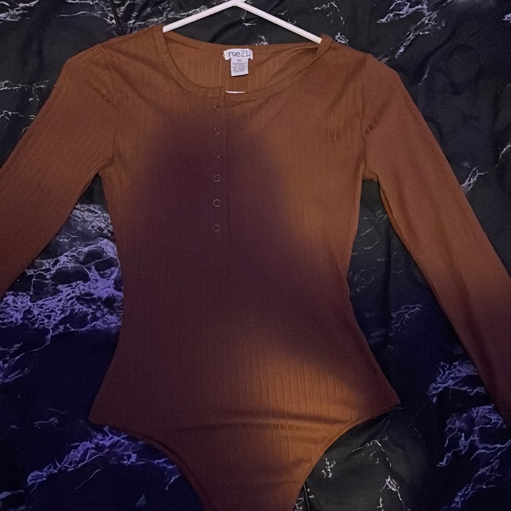 brown body suit
